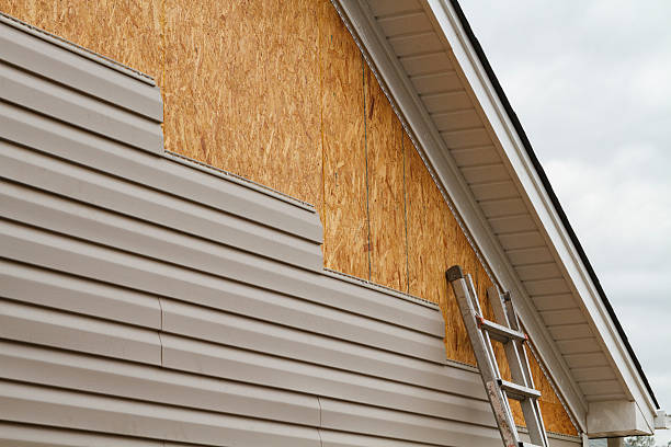 Professional Siding technician working in Bumpass, VA